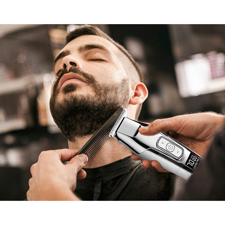 ماشین اصلاح موی صورت کیمی مدل KM-5027 با تیغه تیتانیوم پیشرفته، باتری قابل شارژ با 240 دقیقه مدت استفاده، قابلیت اصلاح خشک و مرطوب، تنظیم طول اصلاح از 0.1 تا 3 میلیمتر و طراحی ارگونومیک کمصدا