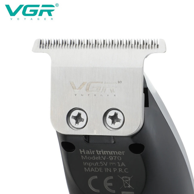ماشین اصلاح موی سر و صورت وی جی ار مدل V-970 با تیغه استیل ضد زنگ، باتری قابل شارژ با 240 دقیقه استفاده، 5 سرعت قابل تنظیم، طراحی ارگونومیک و 3 شانه تنظیم طول 2، 3 و 4 میلیمتر